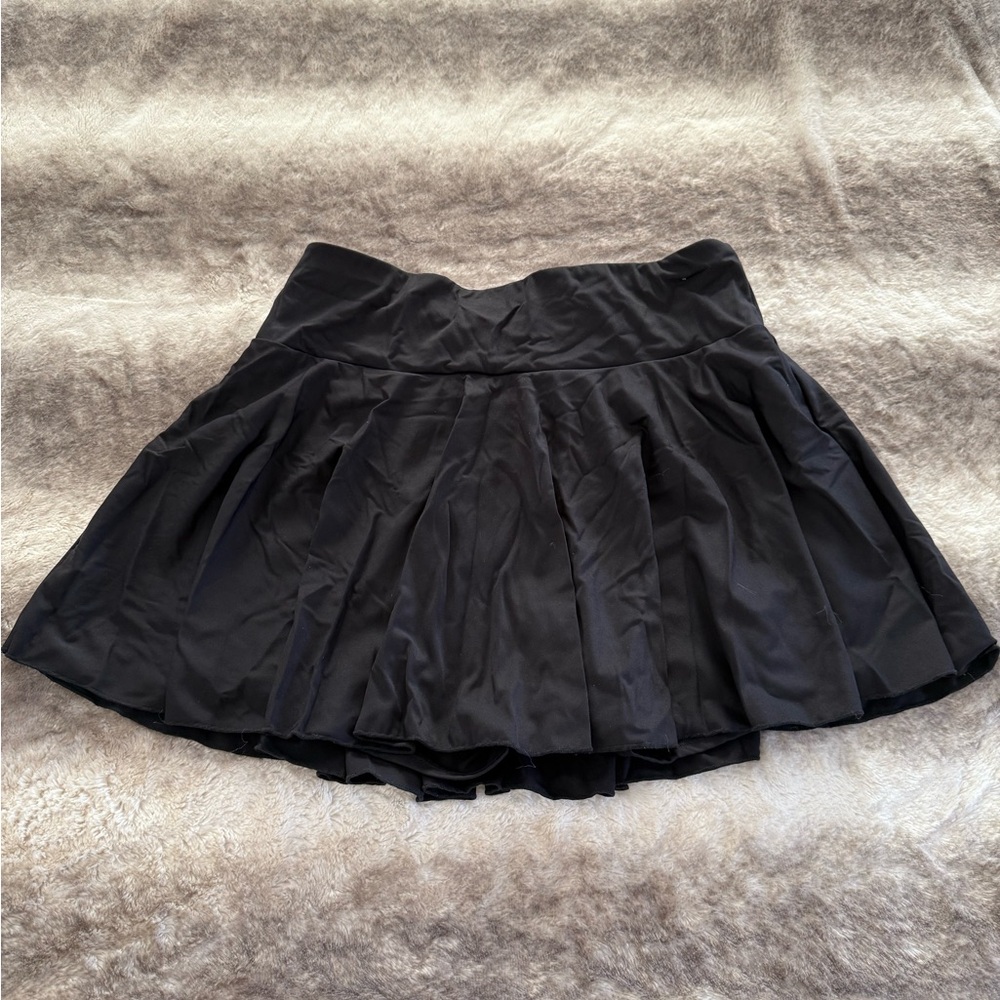 Black Halara athletic pleated skort with pockets size 1x.